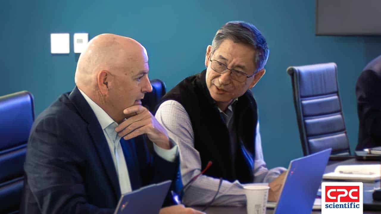John Phipps and Baosheng Liu, PhD discuss large-scale GMP peptide manufacturing projects during CPC Scientific meeting